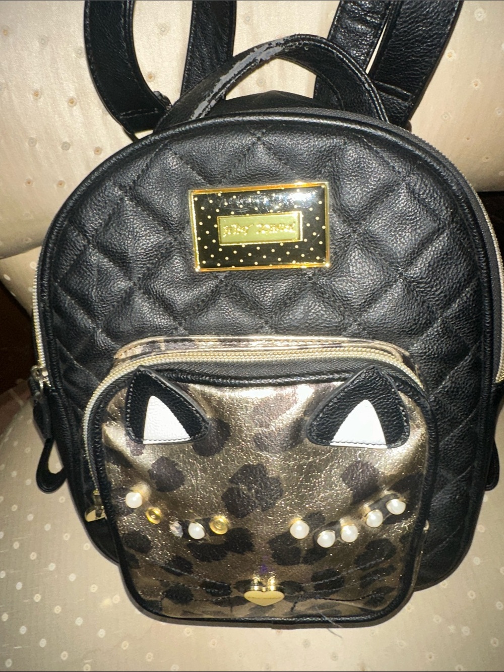 Betsey Johnson Black Quilted Mini Backpack with Gold Leopard Front